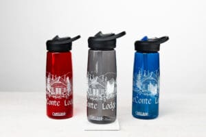 leconte lodge camelbak water bottle in red, gray, and blue.
