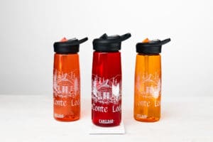 leconte lodge camelbak water bottle in orange, red, and yellow.